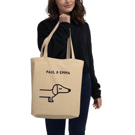 Beige Bio-Stofftasche mit schwarzem Dackel-Motiv und Paul Emma Logo - nachhaltige Hundetasche